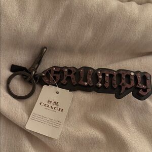 Coach Grumpy Keychain